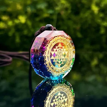 Load image into Gallery viewer, Rainbow chakra pendant necklace with gold Sri Yantra. Luminous spiritual jewelry.