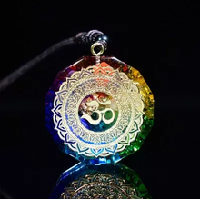 Load image into Gallery viewer, Rainbow chakra orgone pendant necklace with gold OM symbol detail.
